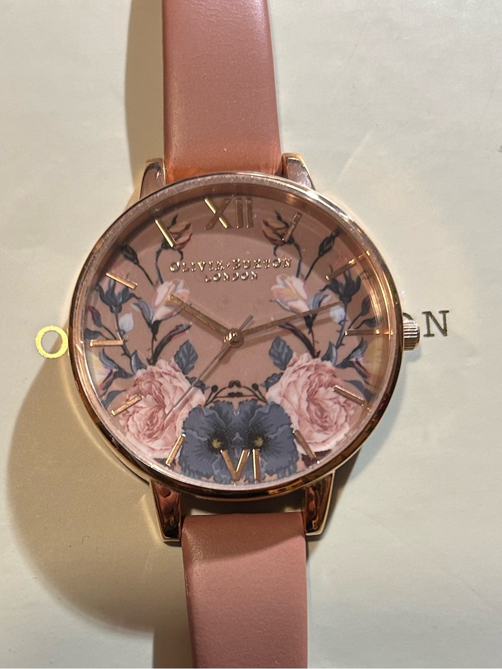 OLIVIA BURTON WATCH WITH 38mm FACE WITH MULTICOLOR FLORAL PATTERN.